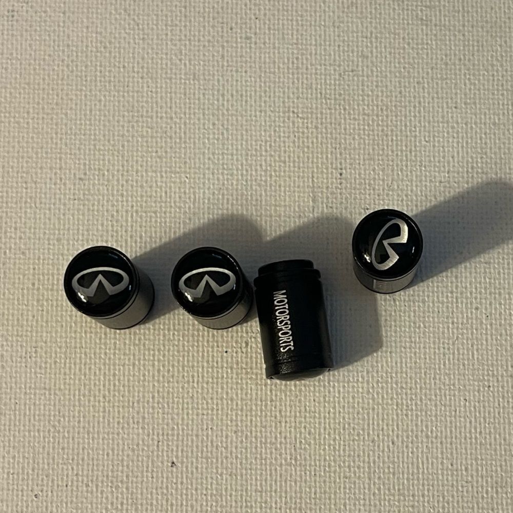 Infinity Motorsports valve Stem caps in black set of 4 NWT